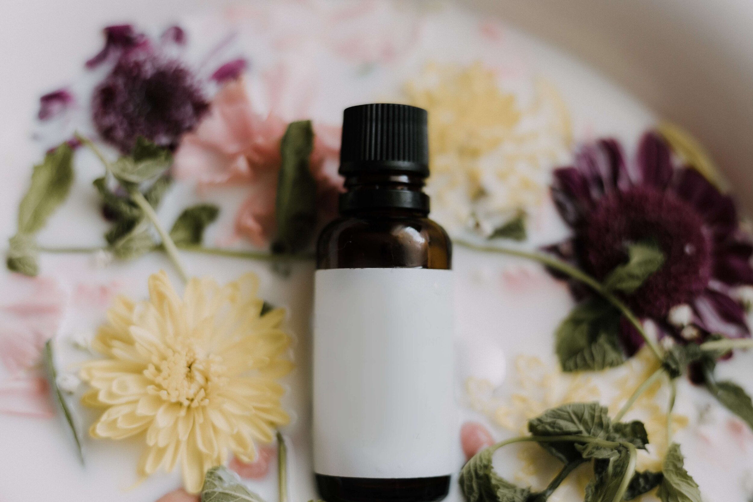 essential oils and coconut cream in bath