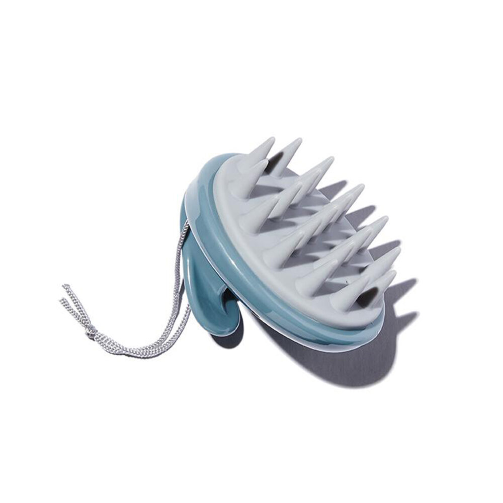 Your New Essential Shower Tool If You Have Oily Hair 
