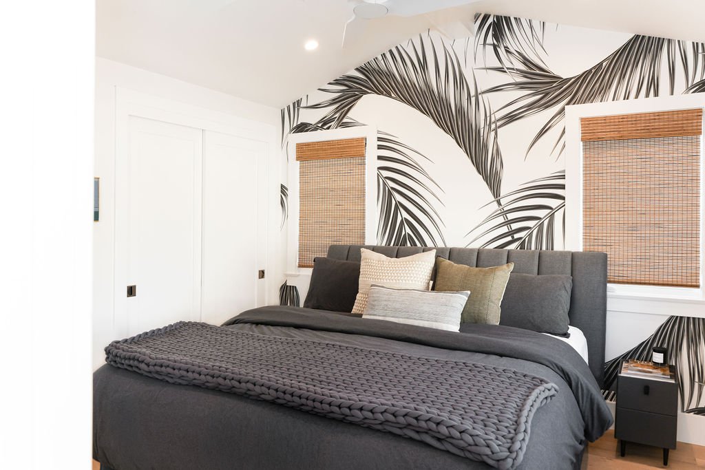 Palm wall covering in Carriage house bedroom