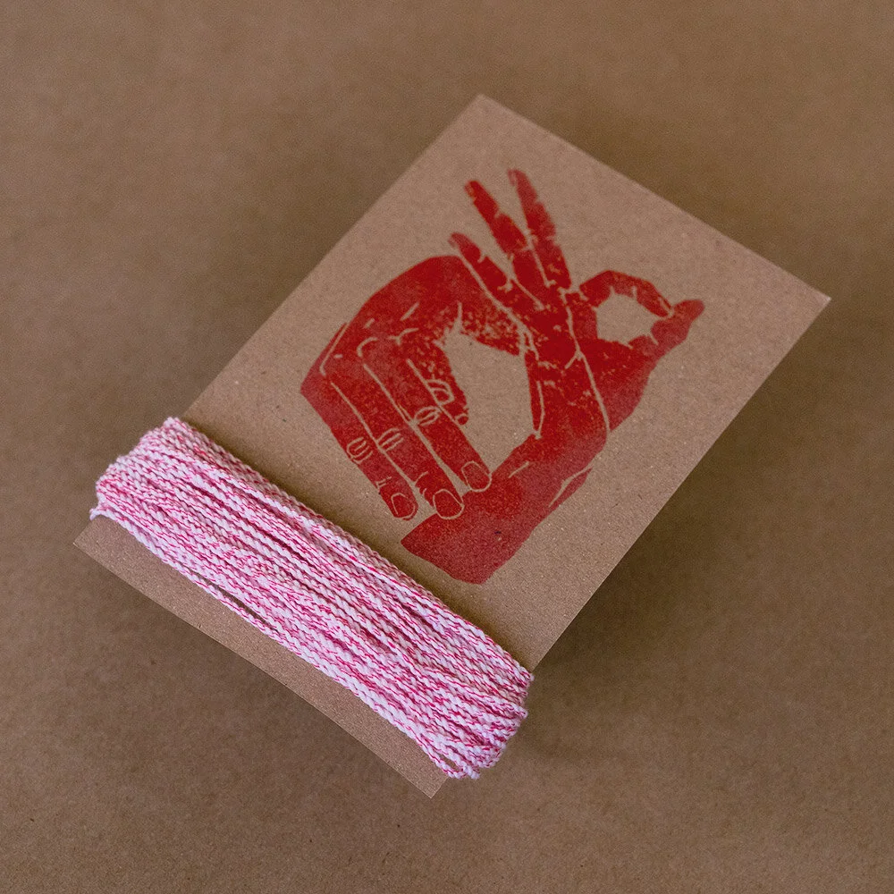 This string is bold in a playful way. Like the big kid during recess that can’t seem to play gently but has the heart of a saint 😂 This string is on the softer side but boast traits of both Rebby and DRAKEN in trace ways. Has the same tidiness in thread twist as Rebby, but with a subtle bit of ‘crisp’ felt throughout play more similar to DRAKEN (about 10% parts DRAKEN crisp per string serving 😂👌🏿) The red thread twisted throughout the string creates a nice optical pink hue that makes the string easy to see, and ‘pleasant’ lol. Something about the way this string handles tricks always gives me a strong inkling to play and explore more immediately after ever catch. Kinda like a book you just can’t stop reading. It just has a certain unique energy to it that you really wouldn’t expect from a softer more ‘wheaty’ poly blend.