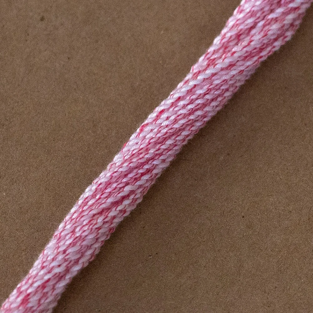 This string is bold in a playful way. Like the big kid during recess that can’t seem to play gently but has the heart of a saint 😂 This string is on the softer side but boast traits of both Rebby and DRAKEN in trace ways. Has the same tidiness in thread twist as Rebby, but with a subtle bit of ‘crisp’ felt throughout play more similar to DRAKEN (about 10% parts DRAKEN crisp per string serving 😂👌🏿) The red thread twisted throughout the string creates a nice optical pink hue that makes the string easy to see, and ‘pleasant’ lol. Something about the way this string handles tricks always gives me a strong inkling to play and explore more immediately after ever catch. Kinda like a book you just can’t stop reading. It just has a certain unique energy to it that you really wouldn’t expect from a softer more ‘wheaty’ poly blend.
