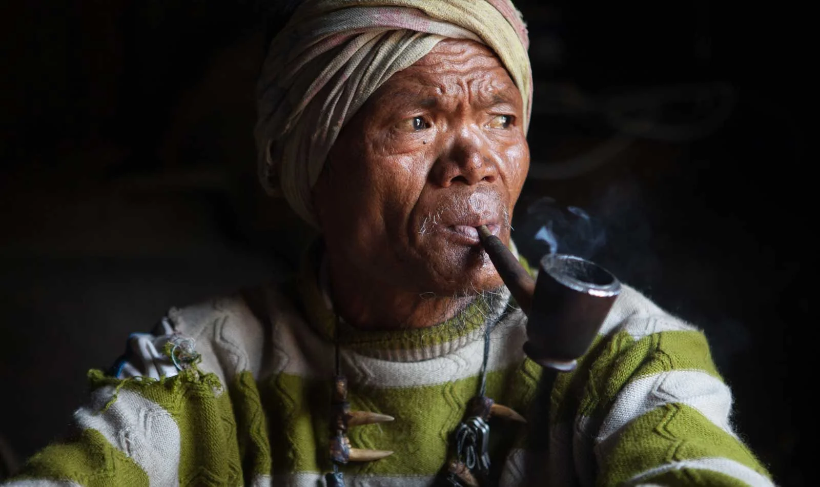 Myanmar-Chin-State-Tattooed-Faces-Man-Smoking.jpg