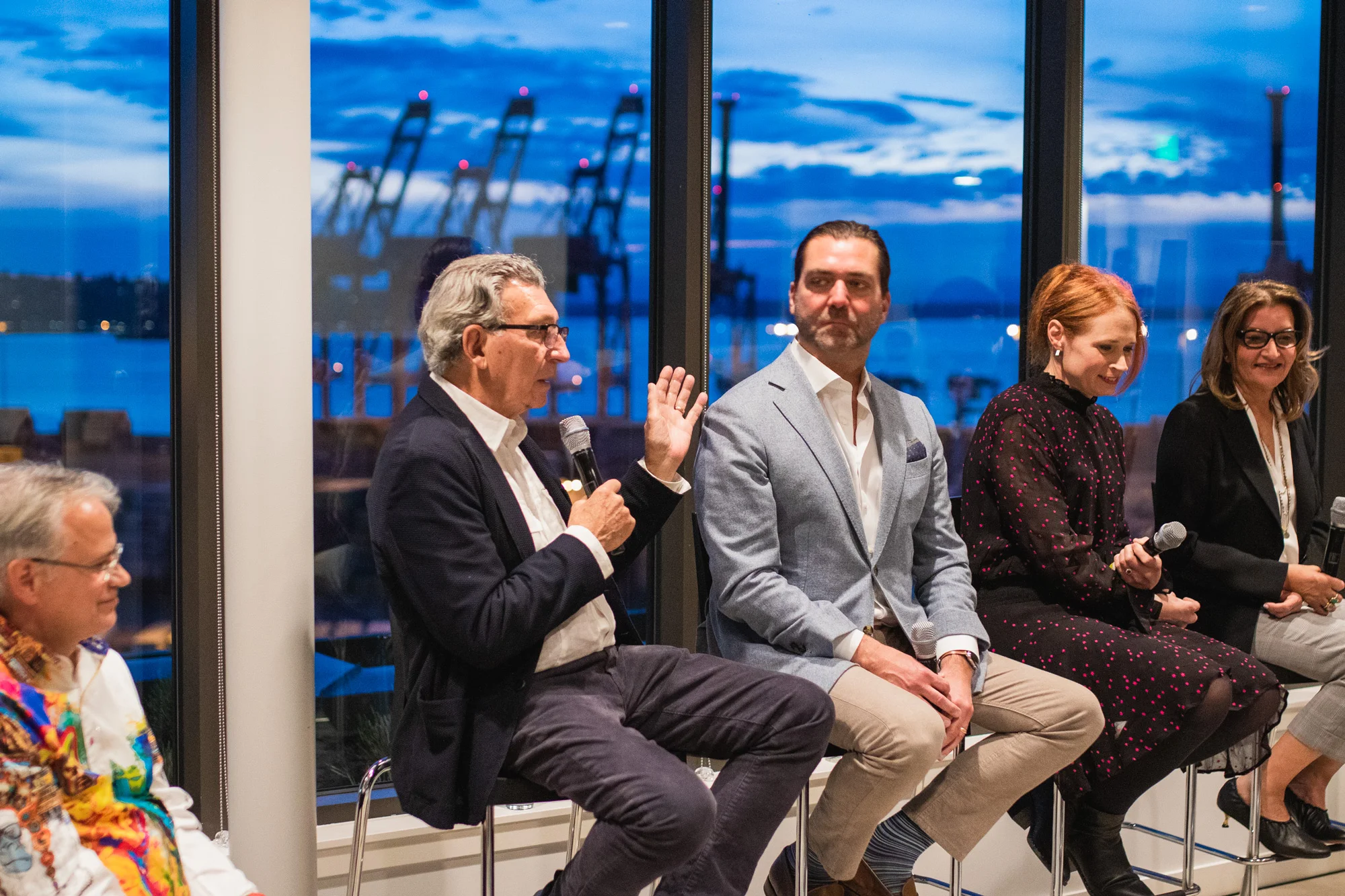 Podcast Recording on March 21 at Gridiron Condominiums Includes Panelists Charlie Royer, Kevin Daniels, Julia Nagele, Moira Holley, and Scott Wasner.