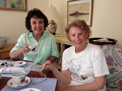 Olga and Denise having tea (recieving services)406x304.jpg