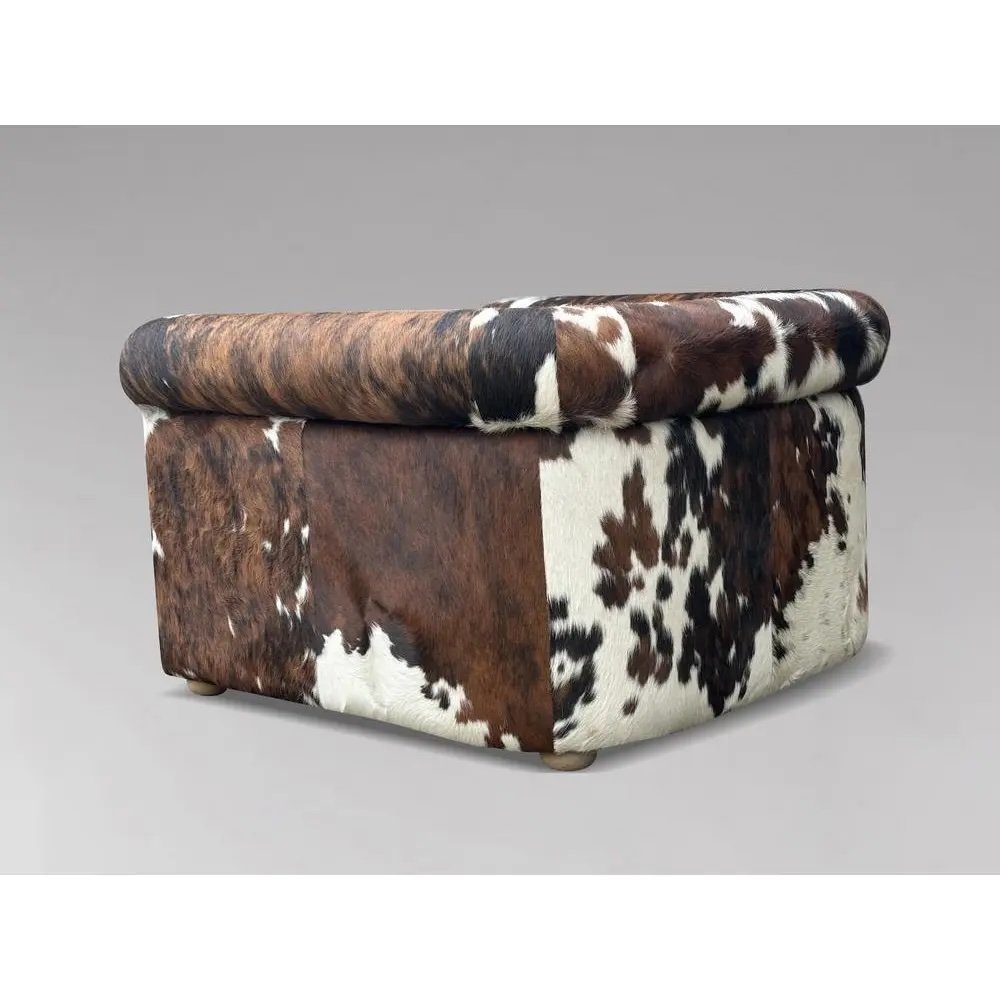 italian-brown-and-white-cow-fur-leather-armchair-1980s-2082-1.jpeg