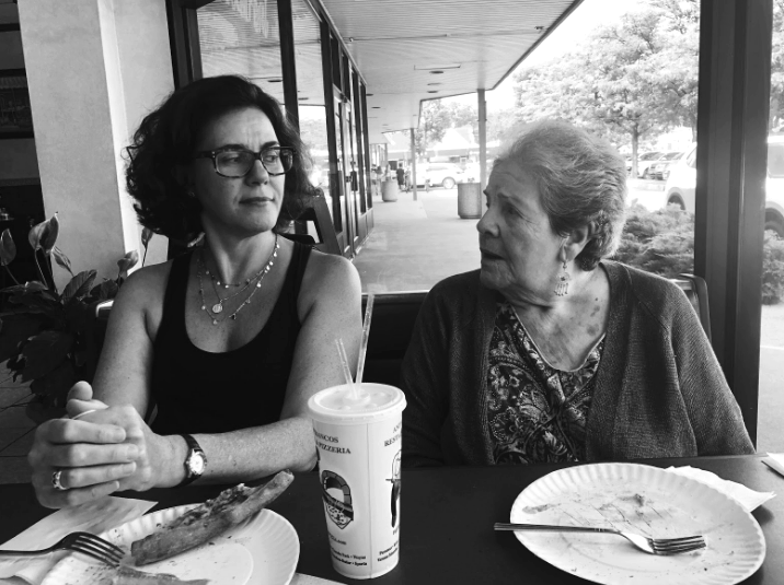 My mother and grandmother looking at each other.