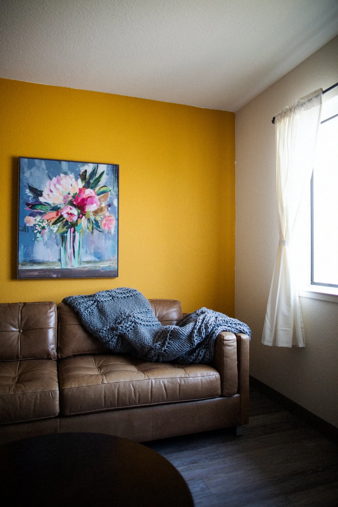 In an apartment ready for re-entry, paintings were donated by students of the Academy of Art University. Credit: Talia Herman for The New York Times