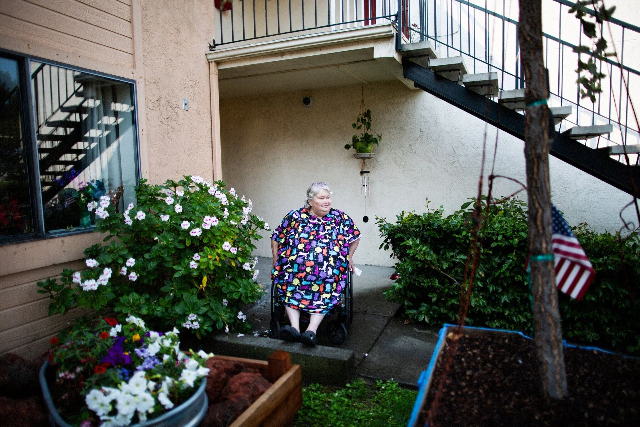 Rosemary Dyer, 69, outside her apartment in the garden she calls “Freedom Forest” provided by Five Keys Home Free. Credit: Talia Herman for The New York Times