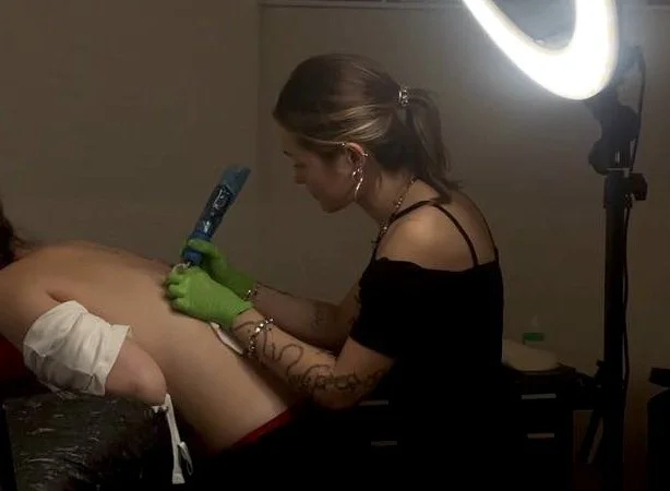 Sister Serpent book a fineline tattoo in Helsinki Finland