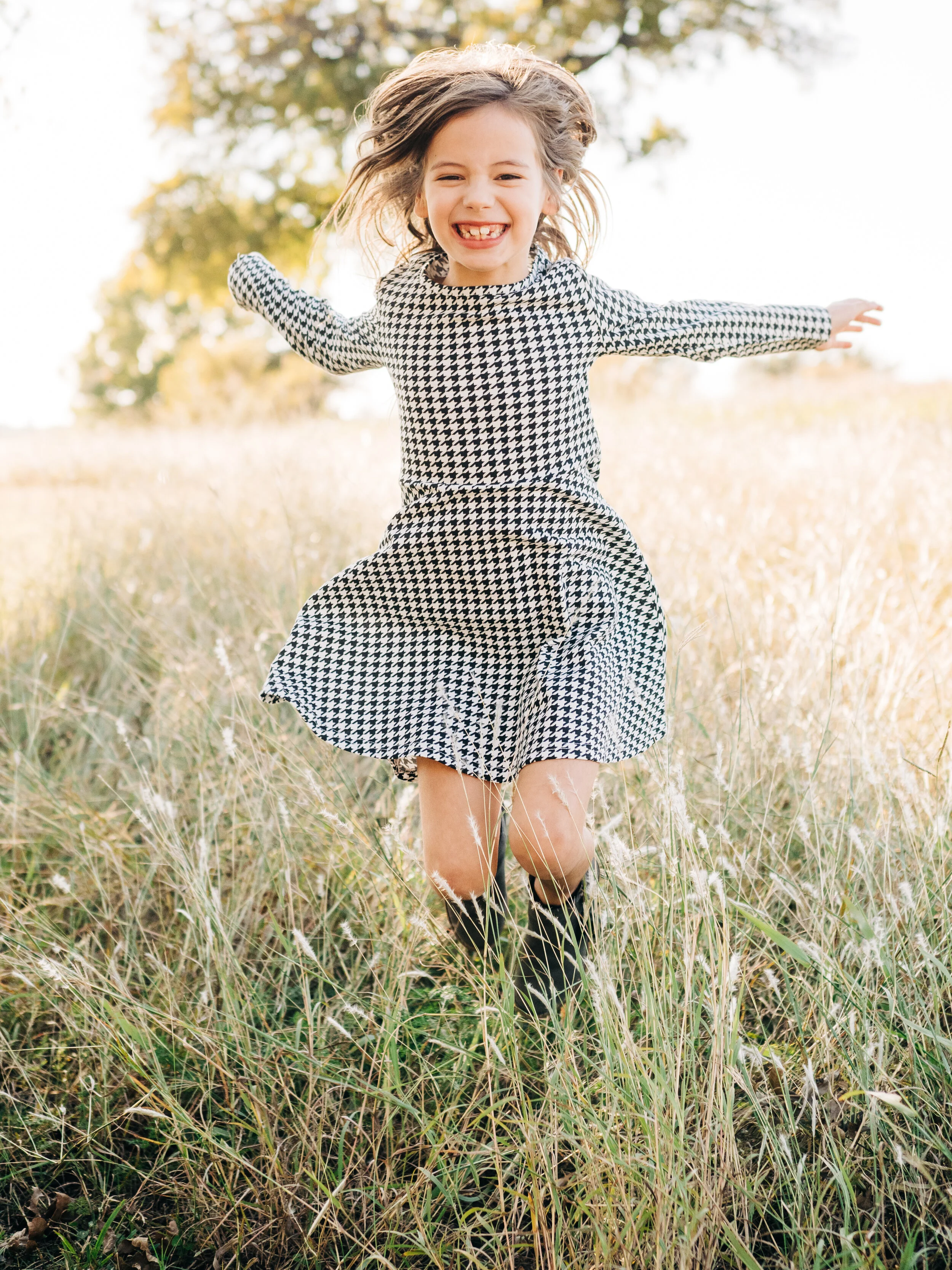 Portrait of a girl in tall grass