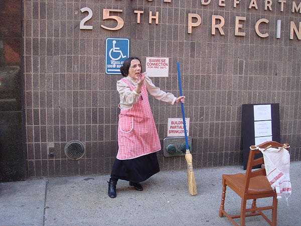 Mama Saracino in front of the 25th Precinct 
