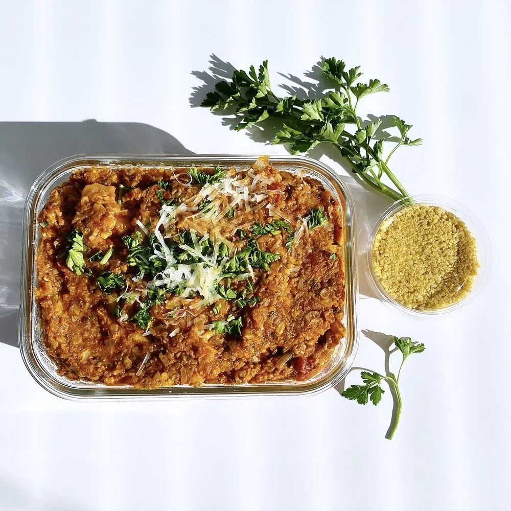 Better Than Bolognese Over Vegan Creamy Polenta with Mac Nut Parmesan