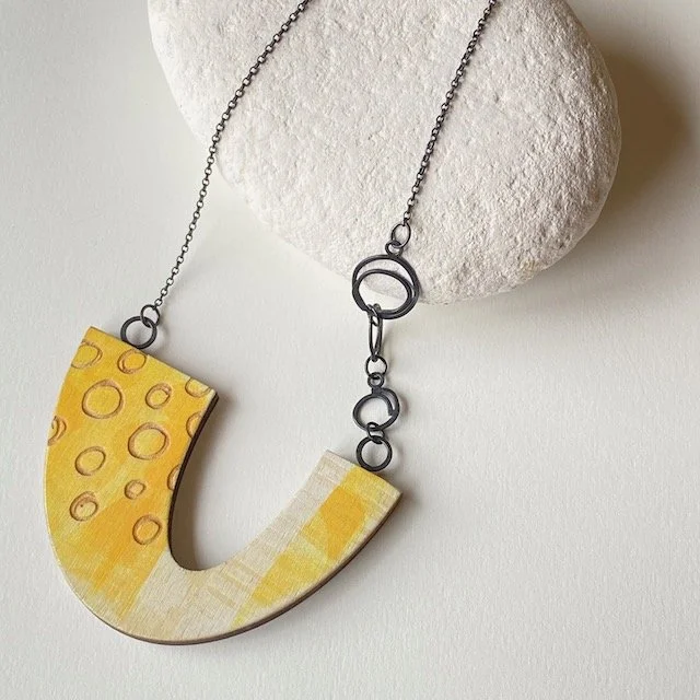 Large U shape pendant necklace.