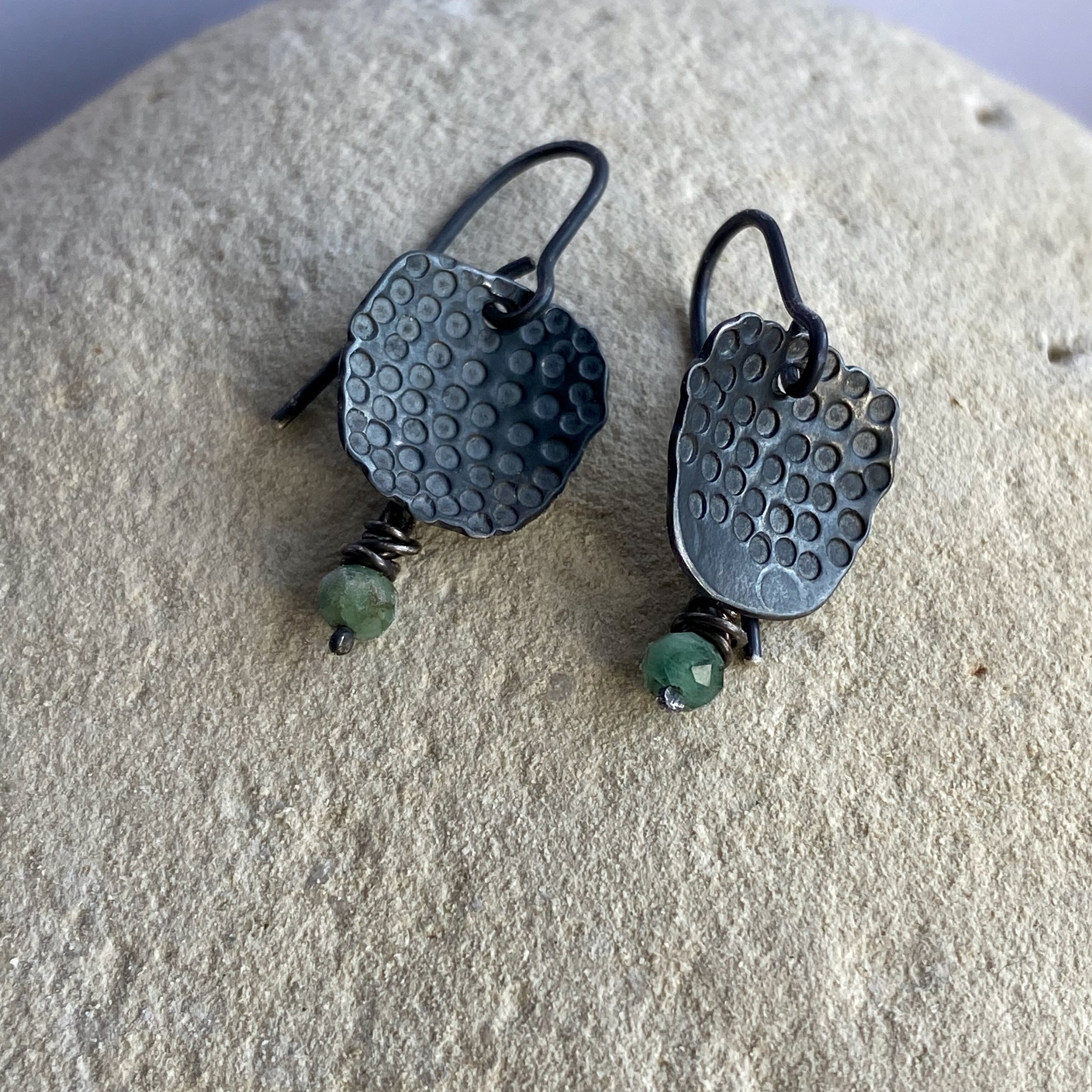 Hand stamped oxidised silver earrings with emeralds