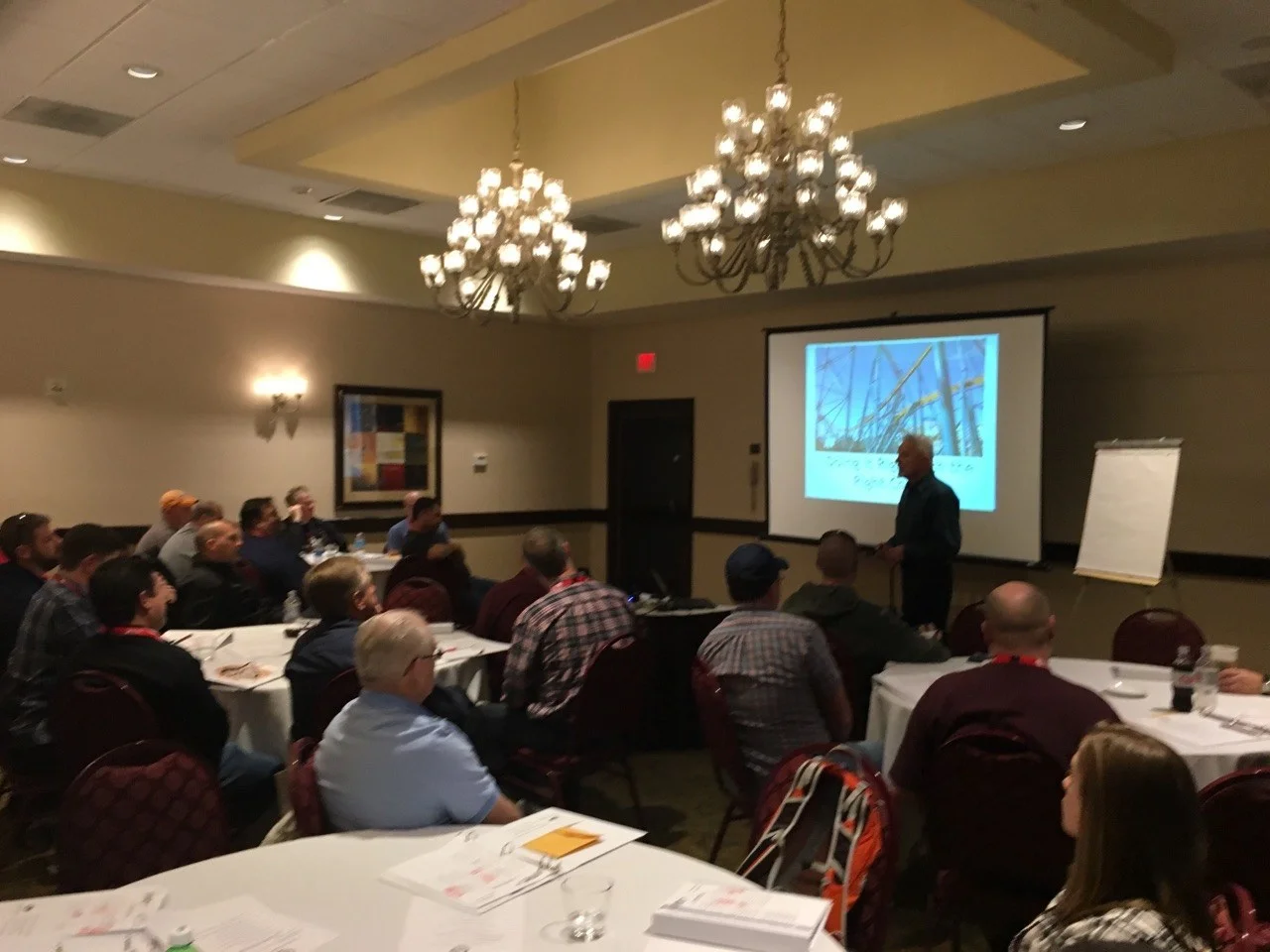 Gary Vorick instructing a course on roller coaster coating maintenance