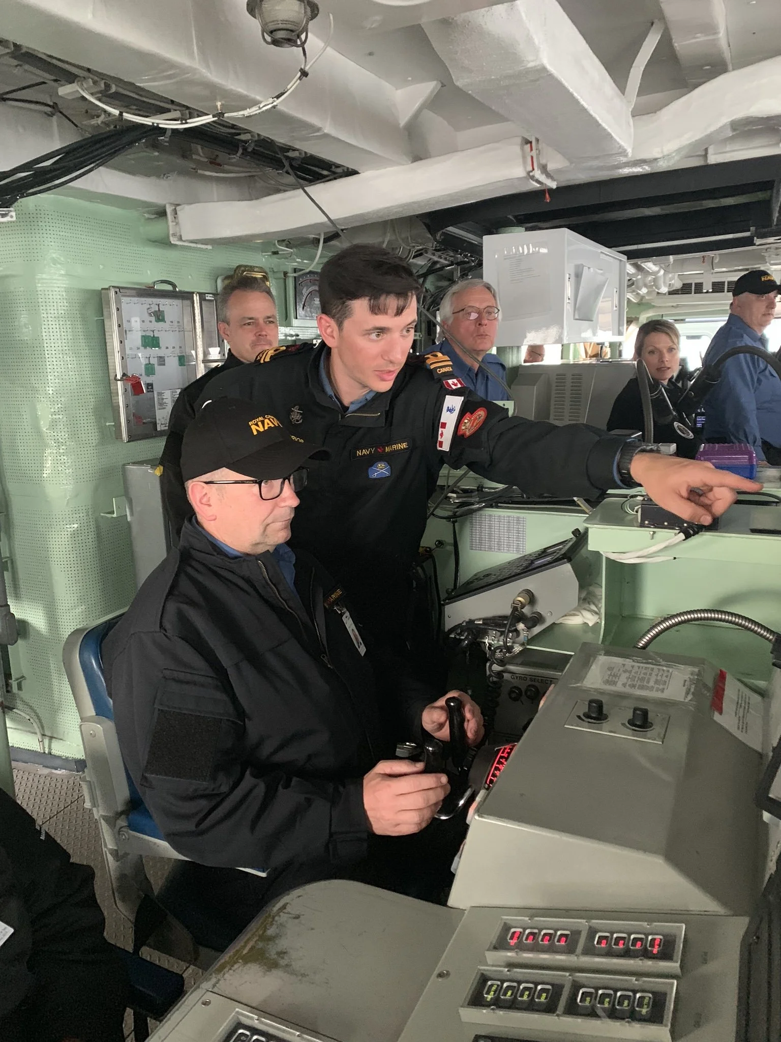 Shawn at the controls steering the HMCS Ottawa
