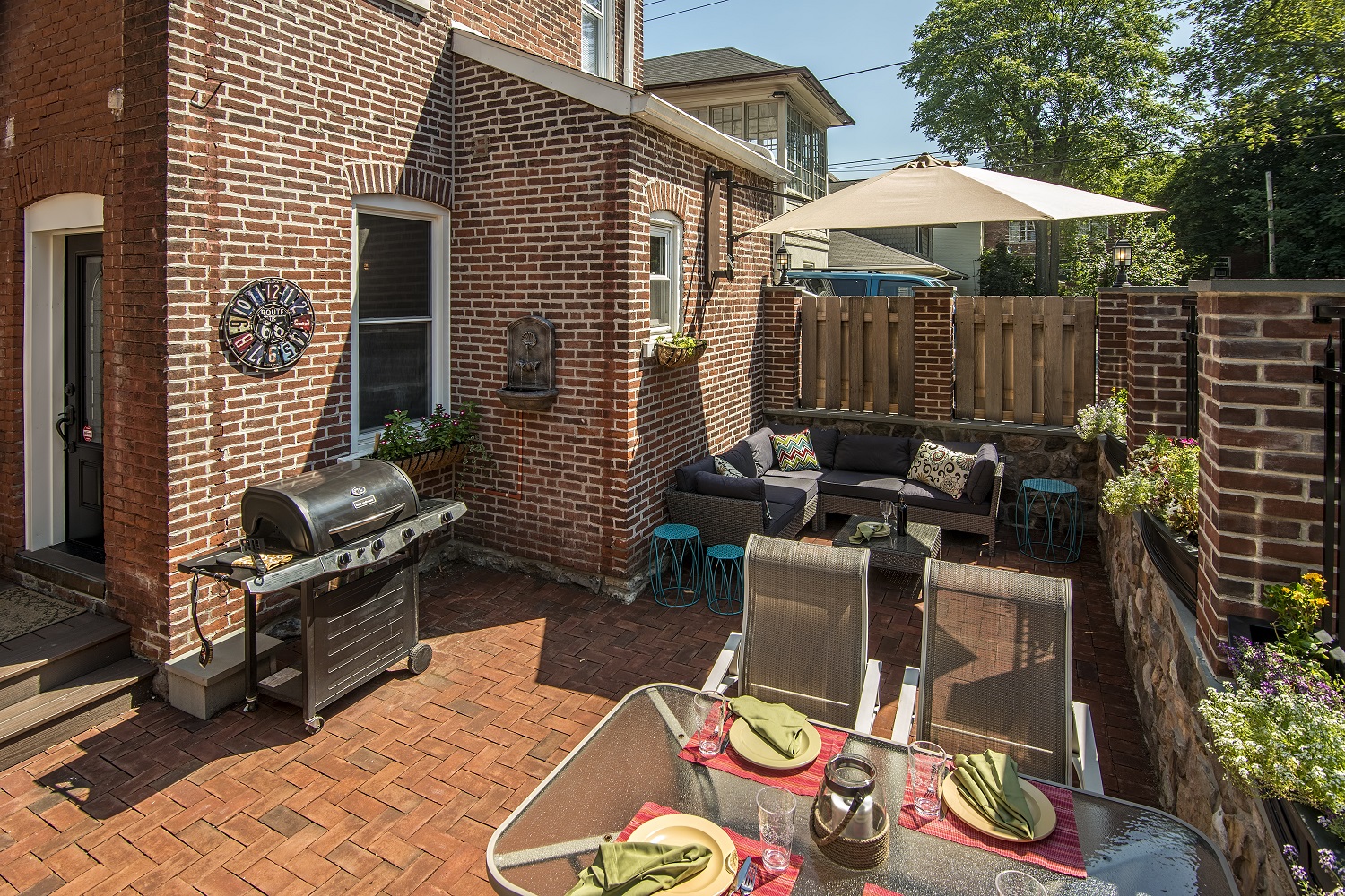 historic home brick paver patio wall mount umbrella
