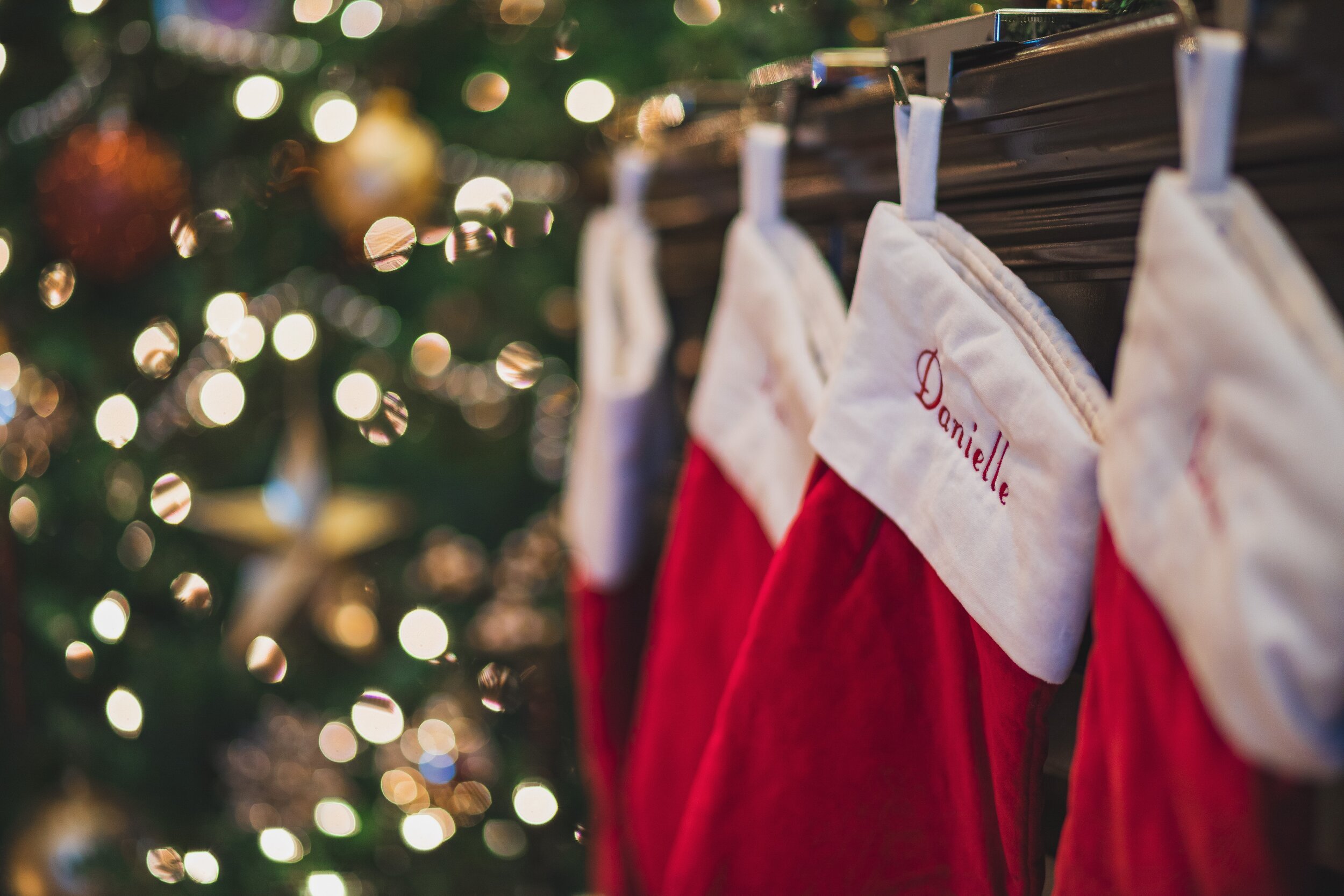 Christmas stockings hung on fireplace mantel 