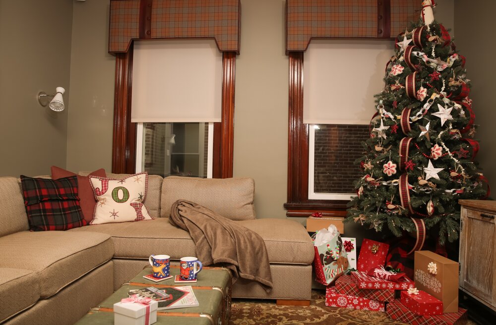 warm and cozy living room with Christmas tree