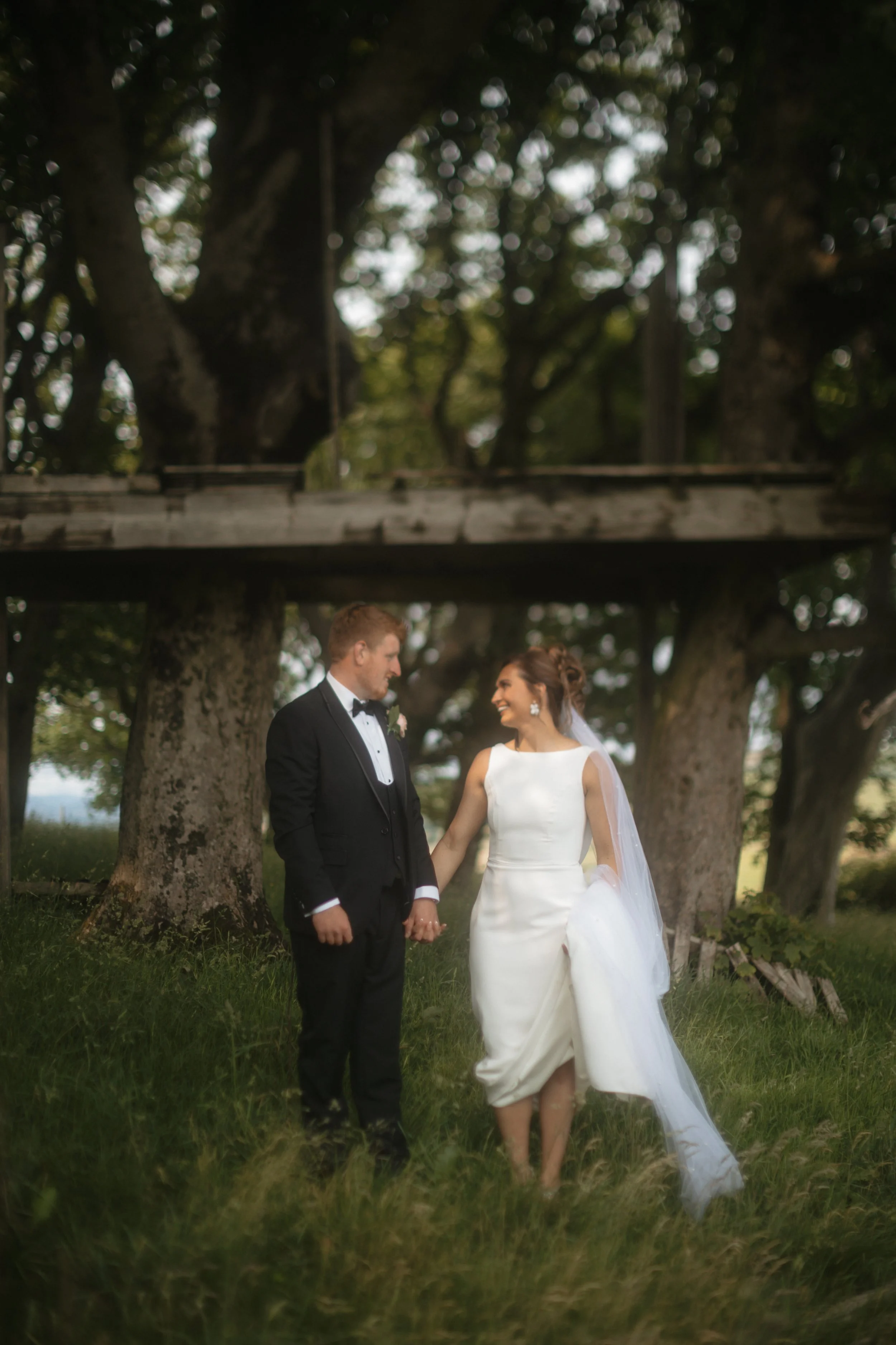 Modern and natural edit of bride and groom against a lush backdrop in the lake district national park on their wedding day
