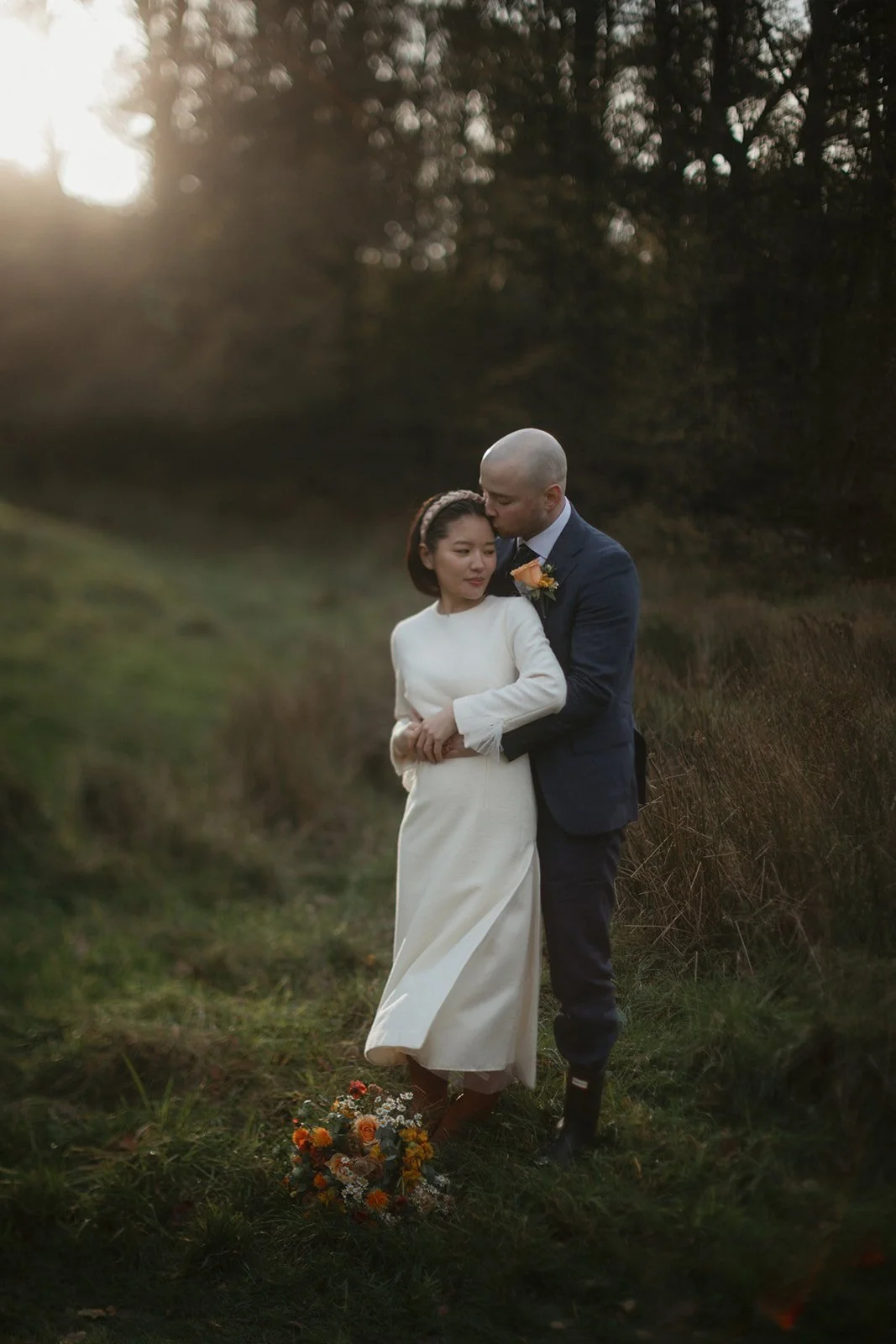 Beautiful mixed race couple on their intimate elopement wedding day at cote how near rydal in the lake district photographed beautifully by eriinbrowne in a dreamy but natural way