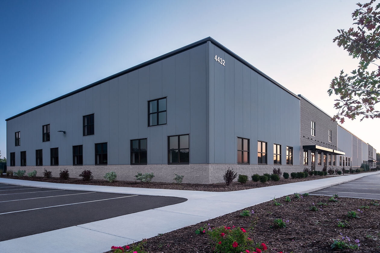 BUTTERMILK COURT MULTI-TENANT The first of several multi-tenant buildings in Hudsonville, MI. We believe the building represents “Good Goods” with it’s multi-material selection and a design which resembles multiple store fronts.