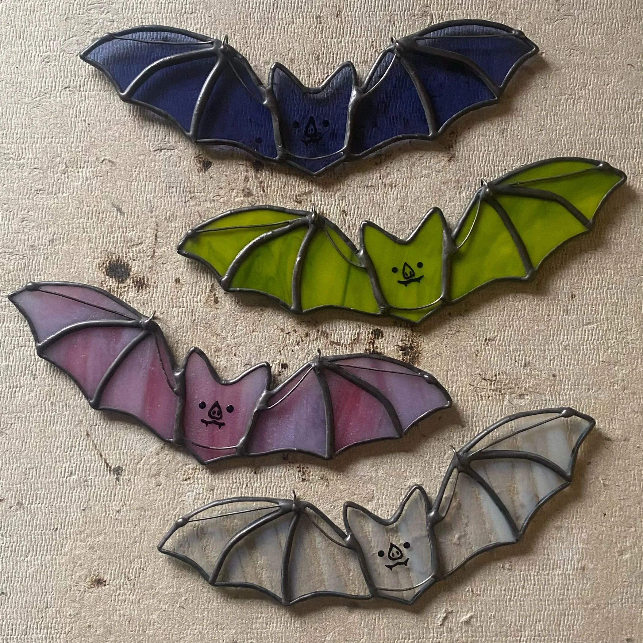 Just painted their cute faces! Soon ready to fly away to new roosts 💕🦇💕 #stainedglass #stainedglassbat #stainedglassbatsuncatcher