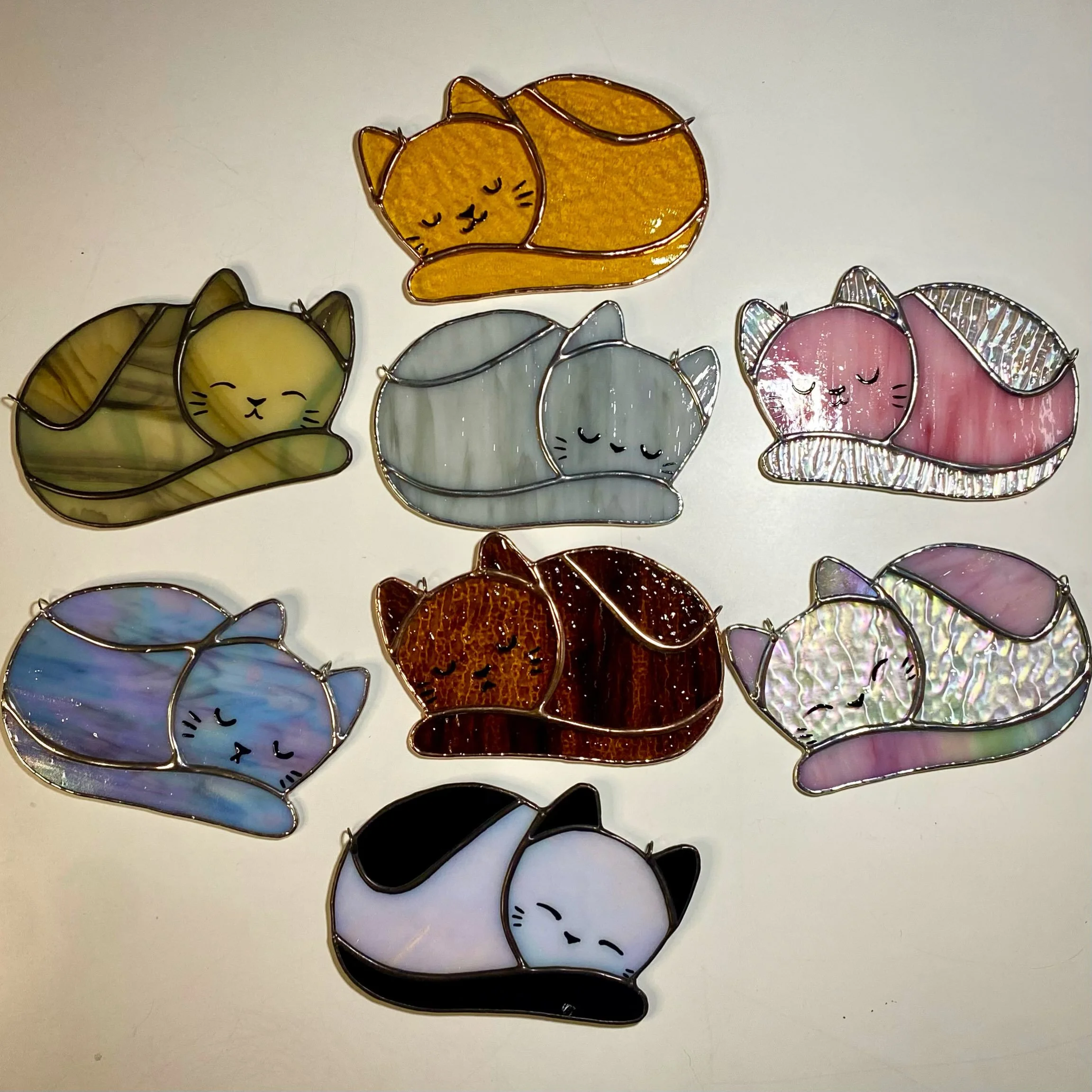 Soldered, patina-ed, polished and painted&hellip; and ready for a nap. #sleepykitties #stainedglass #stainedglasssuncatchers