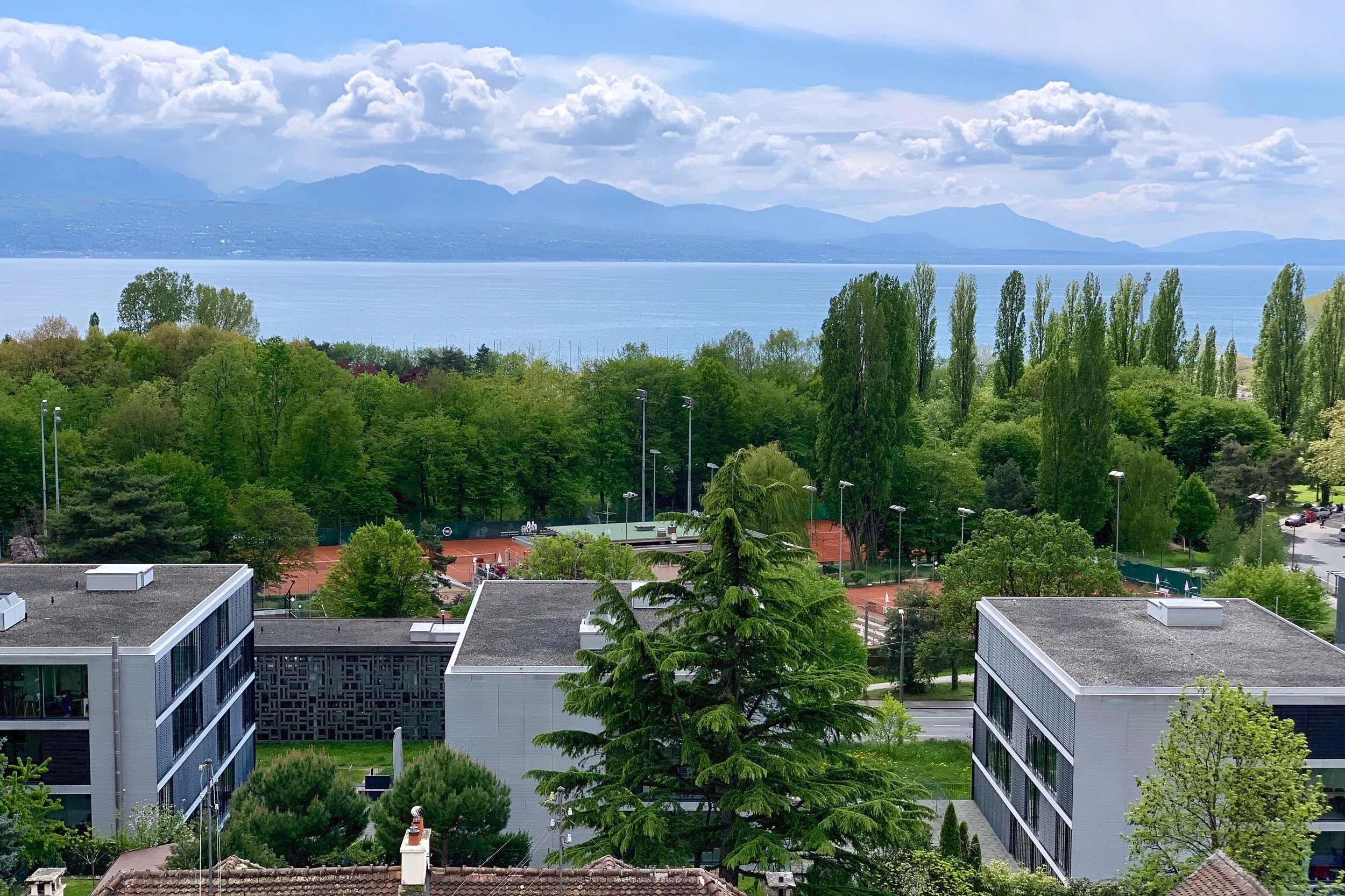 Clay-court tennis, as viewed from my terrace, as I wrote this post. Lausanne, Switzerland. May 3, 2019.