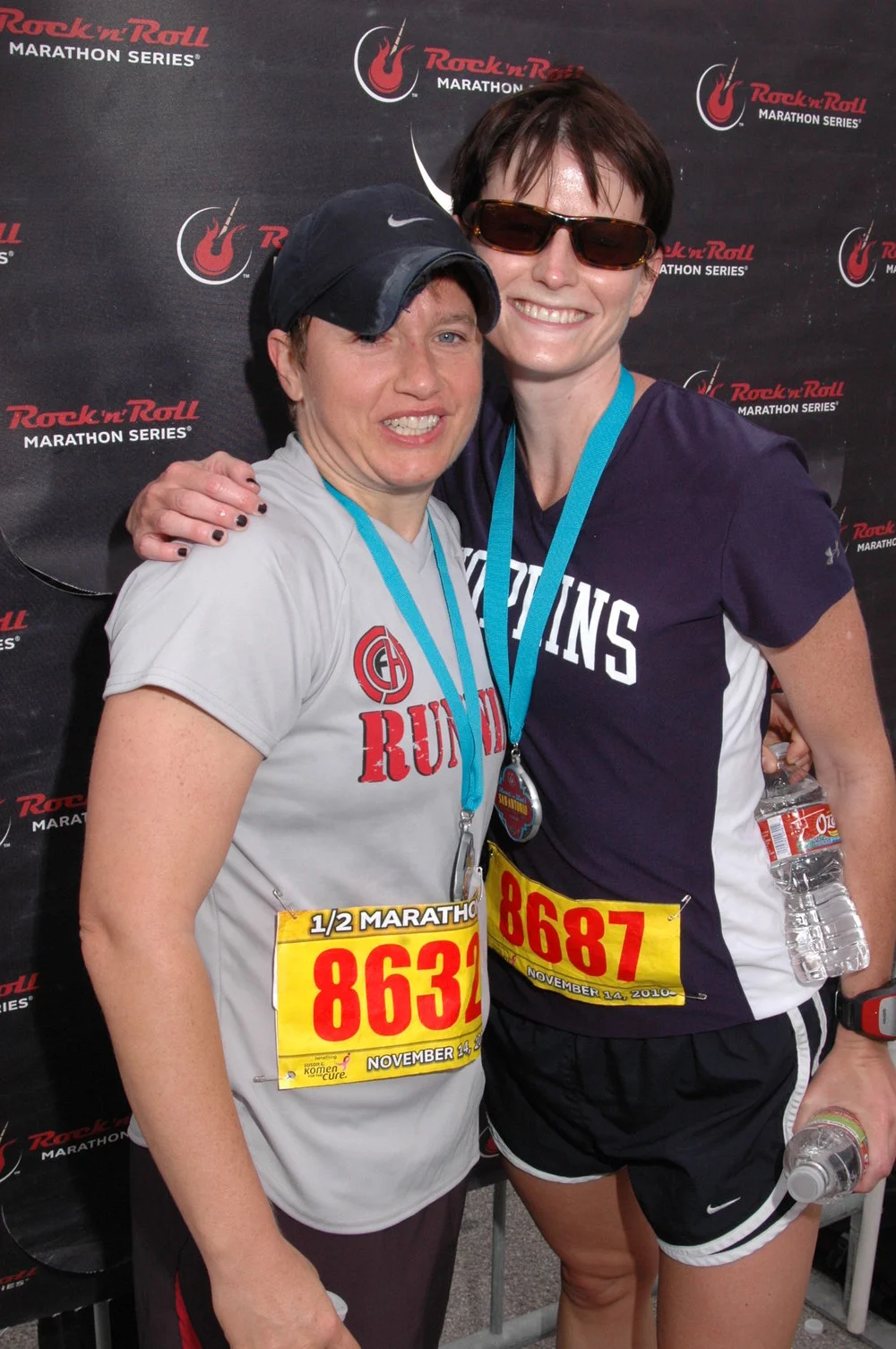 One of my closest friends and I looking like a complete disaster after I paced her to a personal best in the 2010 San Antonio Half Marathon.