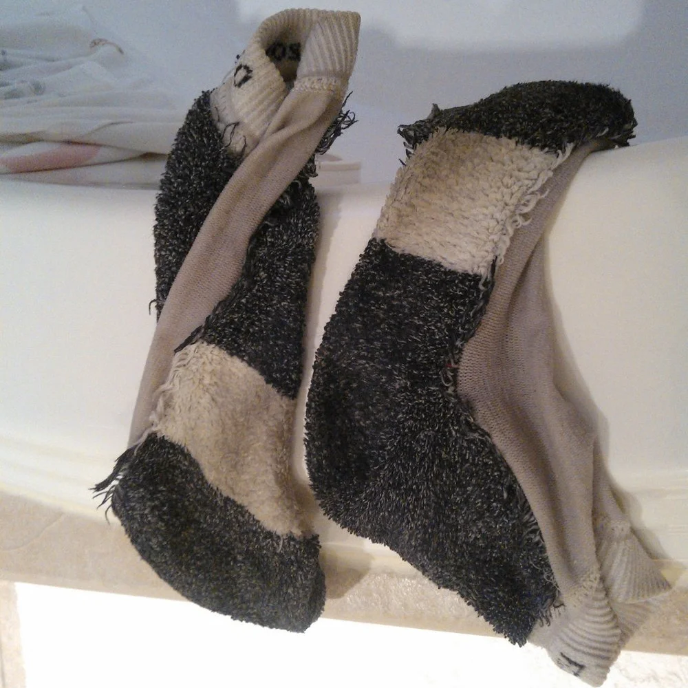 Socks drenched from a early morning run in the soaking rain. September 2012.