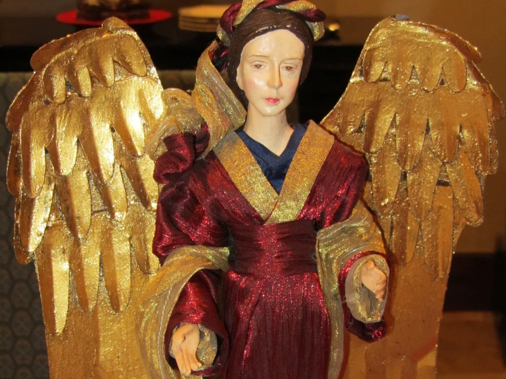 An angel figure my mother places on a table each year at Christmas. December 25, 2010.