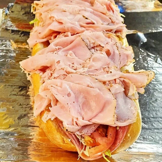 National hoagie day calls for our ENZO Hoggie! We put a twist on the traditional Italian hoagie. Loaded with fresh turkey, Genoa salami, Capicola, Pepperoni, shaved Pepper Ham, and Provolone cheese.

#hogislandsteaks #hogisland #hogislandpizza&nbsp; 