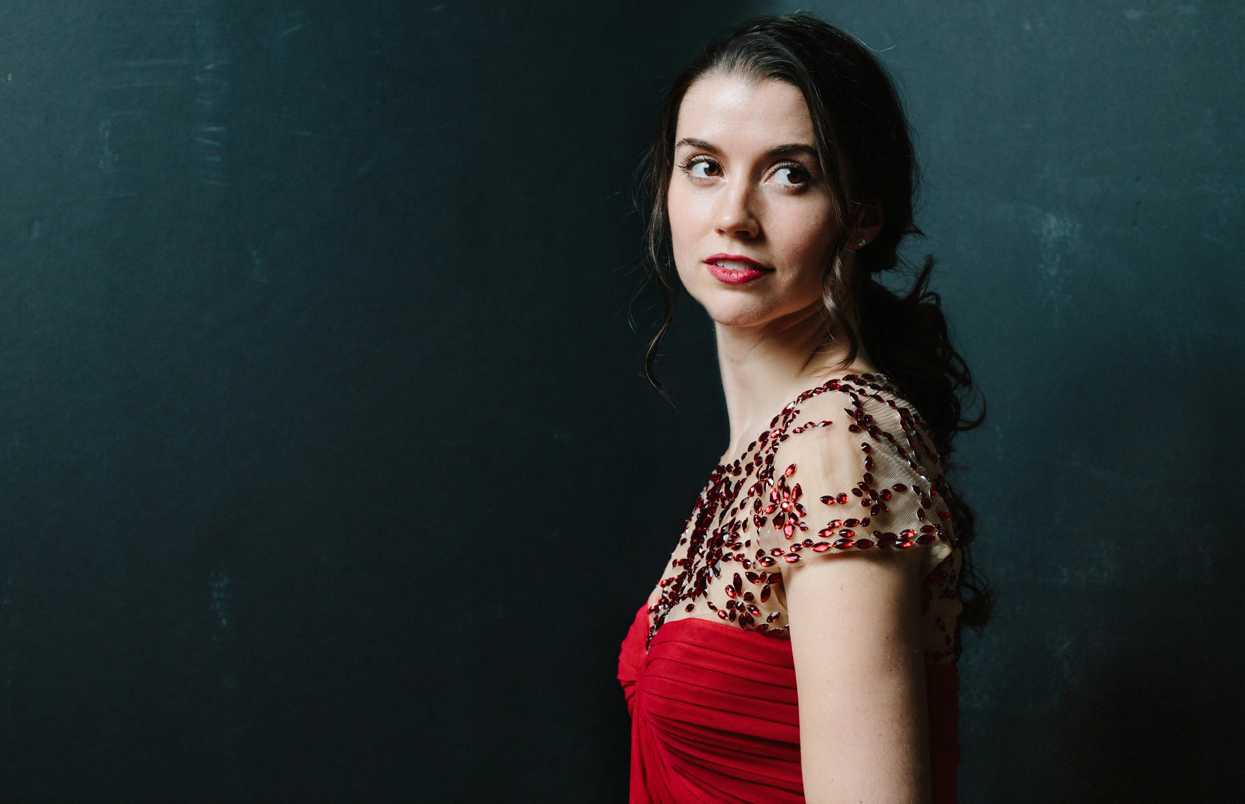 Tatiana headshot 6 red side.jpg