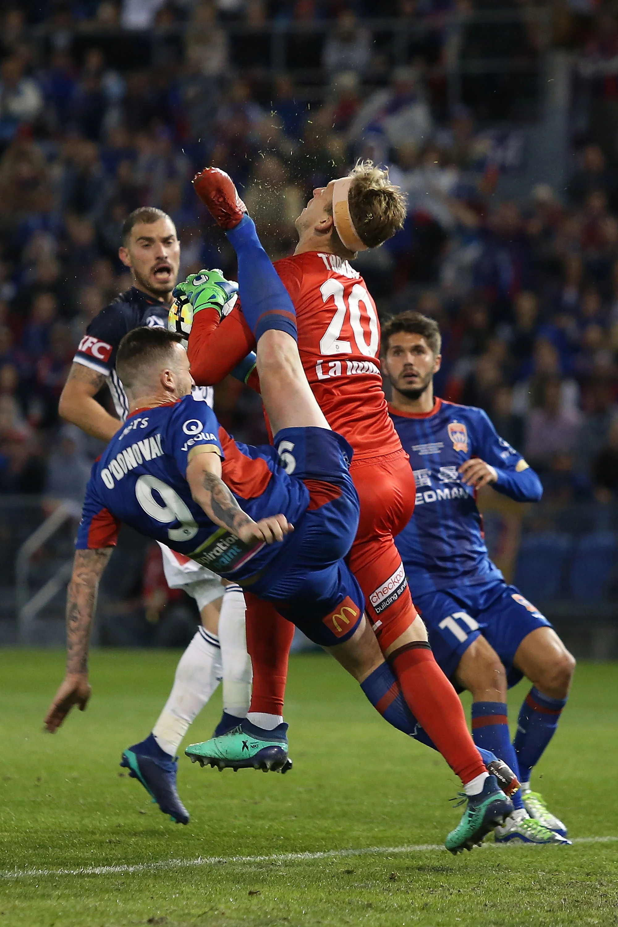  Roy O'Donovan of the Jets collides with Lawrence Thomas of the Victory during the 2018 A-League Grand Final match between the Newcastle Jets and the Melbourne Victory at McDonald Jones Stadium on May 5, 2018 in Newcastle, Australia. (Photo by Jason 