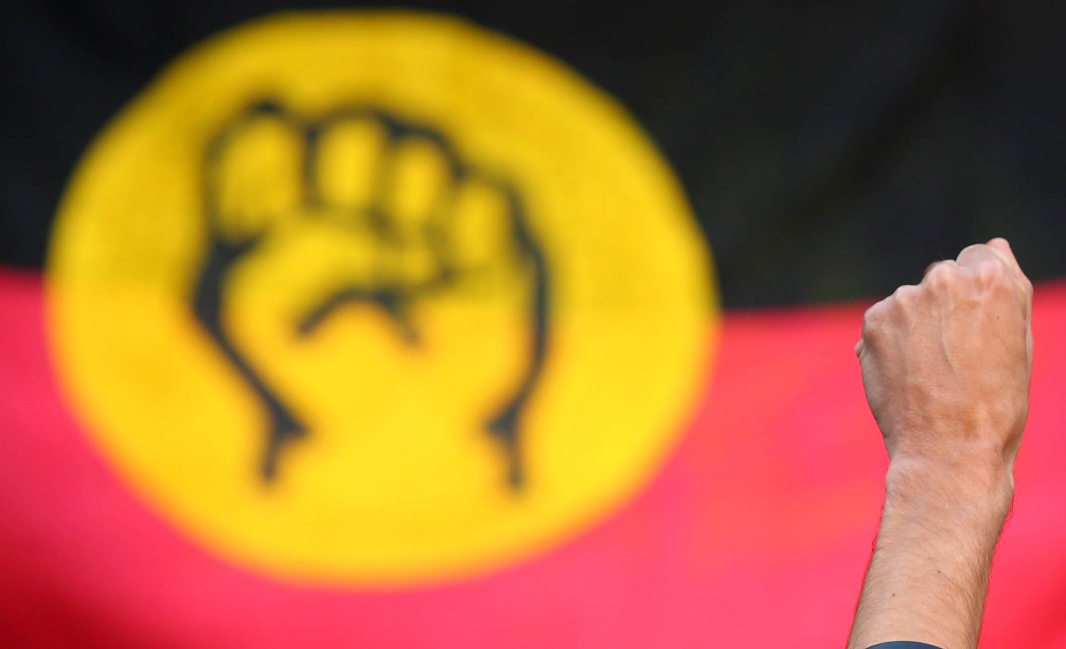 A protester during the demonstration demanding justice for Aboriginal youth tortured in detention on July 30, 2016 at Town Hall, Sydney. (Photo by Jason McCawley for News Corp)