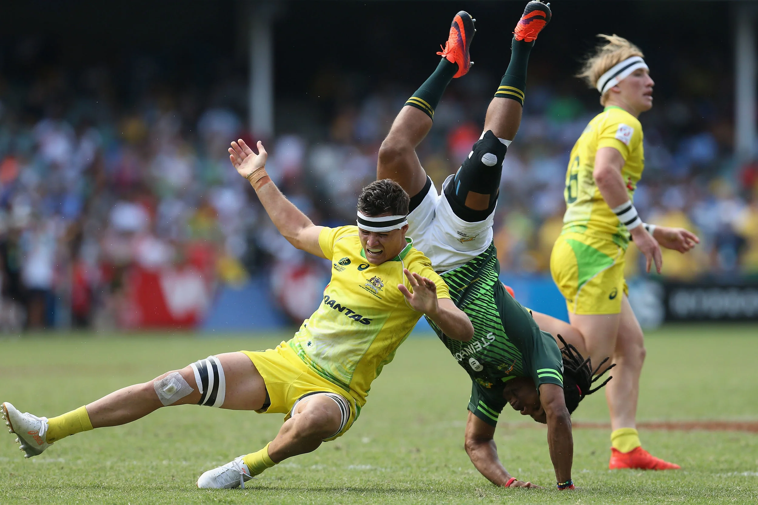  Rosko Specman of South Africa is tackled by Mick Adams of Australia during the Cup Semi Final match between Australia and South Africa in the 2017 HSBC Sydney Sevens at Allianz Stadium on February 5, 2017 in Sydney, Australia. (Photo by Jason McCawl