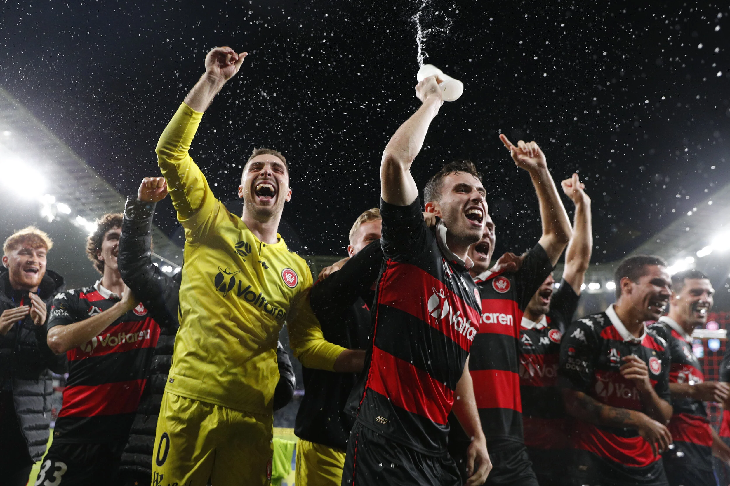  Thomas Aquilina and Daniel Margush of the Wanderers celebrate victory following the A-League match between Western Sydney Wanderers and Sydney FC at Bankwest Stadium, on May 01, 2021 in Sydney, Australia. (Photo by Jason McCawley/Getty Images) 
