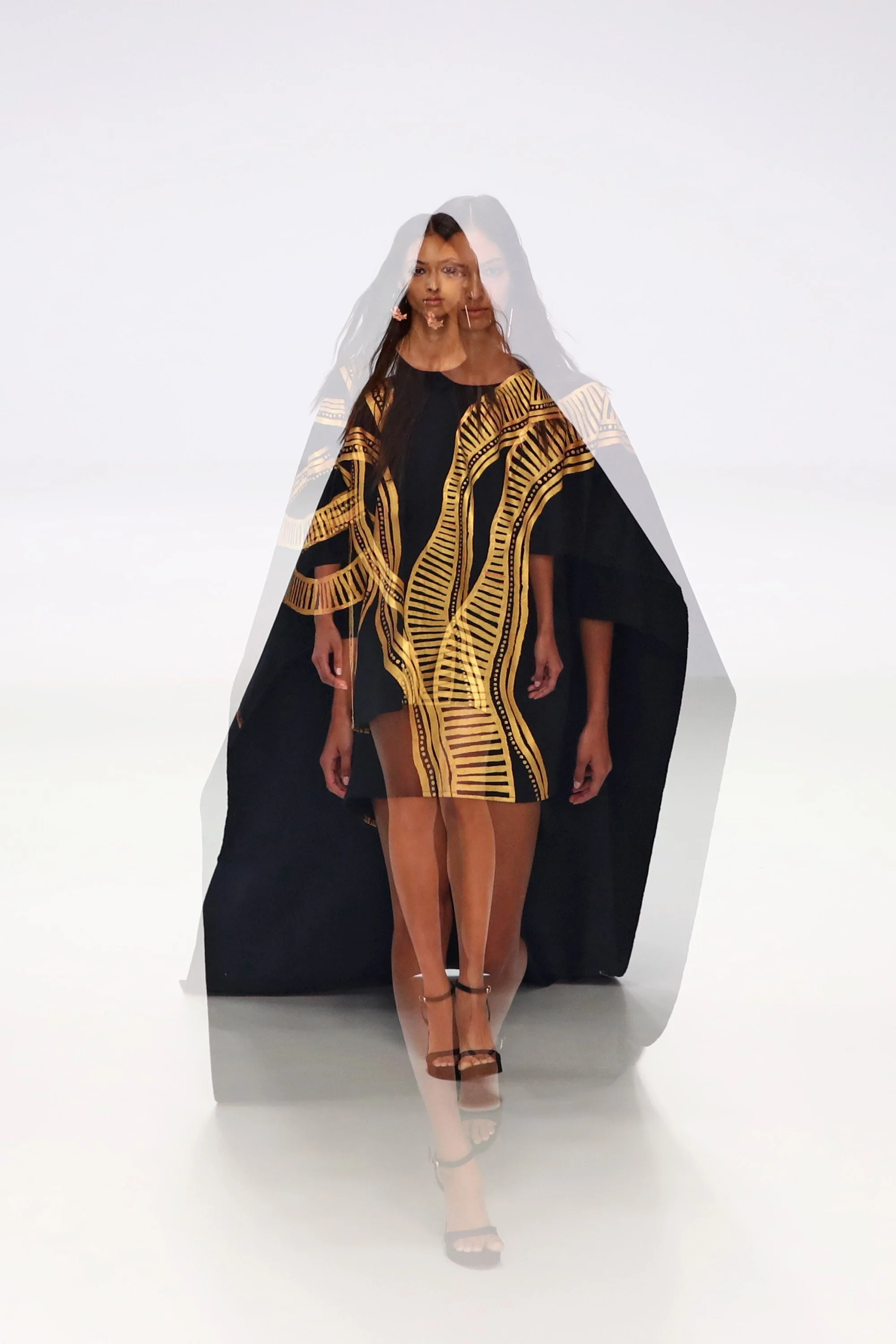  A model walks the runway wearing a design by EDITION X SARRITA KING during the New Generation Showcase show at Australian Fashion Week 2026 at Museum of Contemporary Art on May 14, 2026 in Sydney, Australia. (Photo by Jason McCawley/Getty Images) 