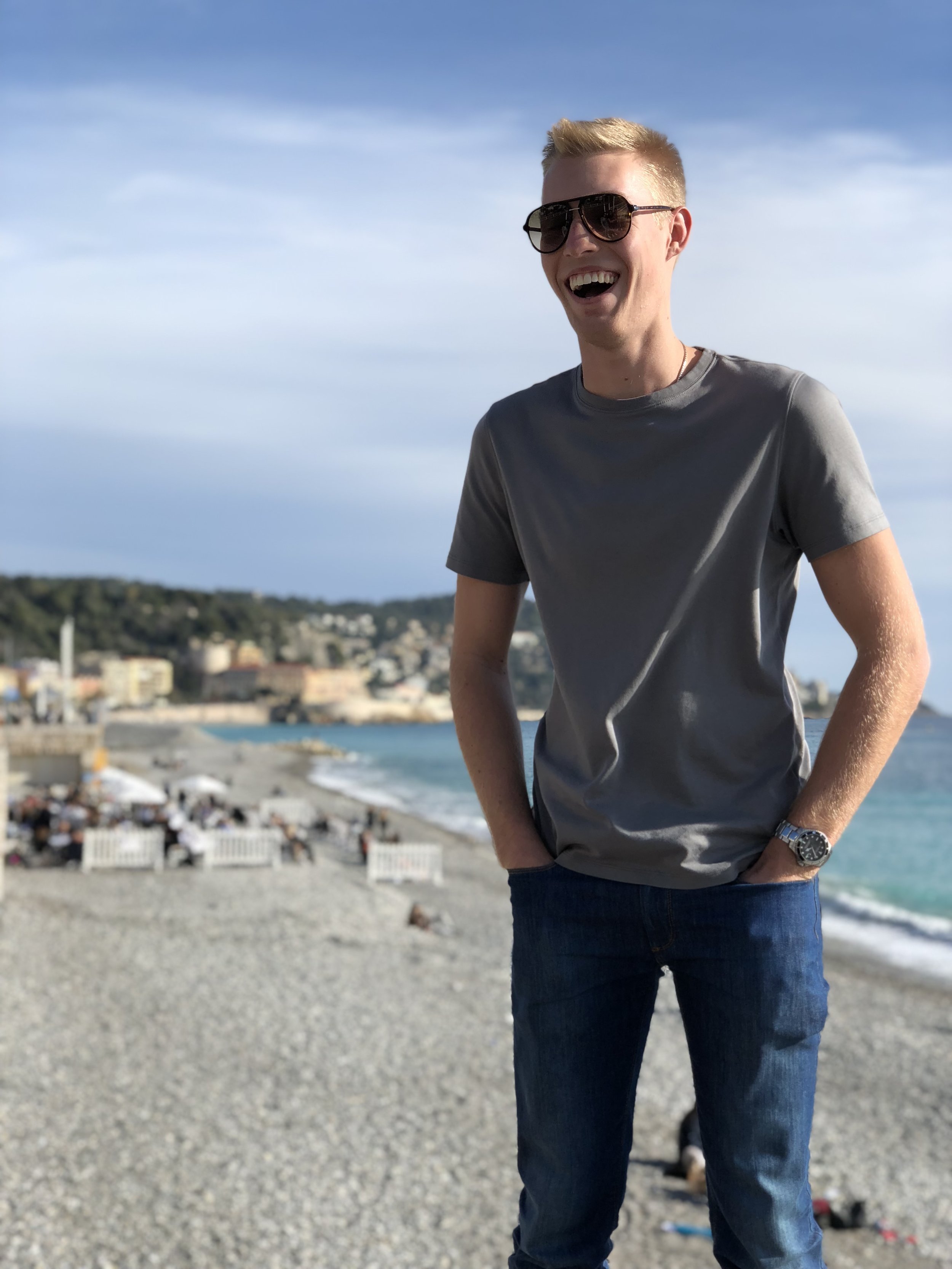 Adam in Nice, France in front of the beach