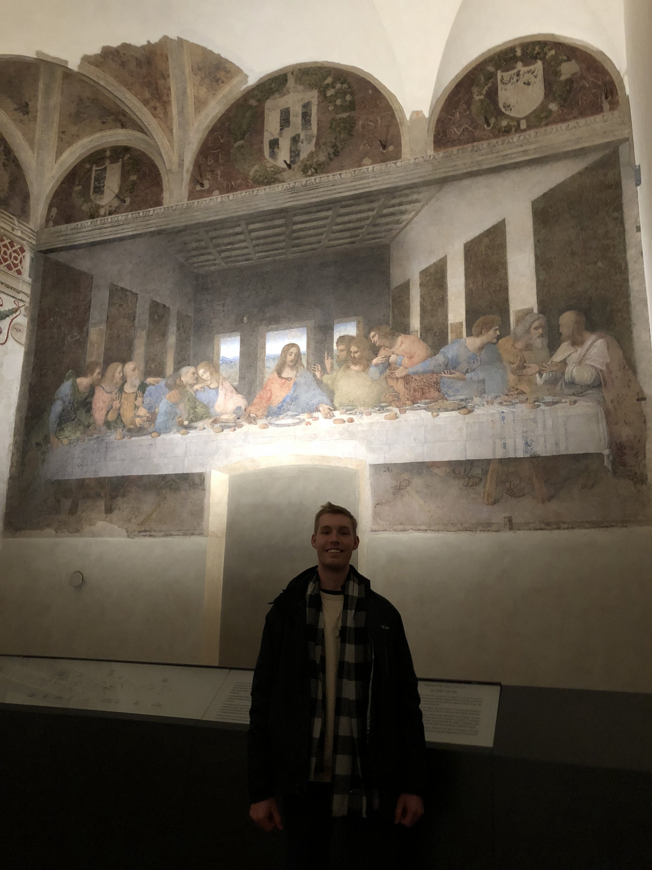 Adam in front of the Last Supper in Milan, Italy