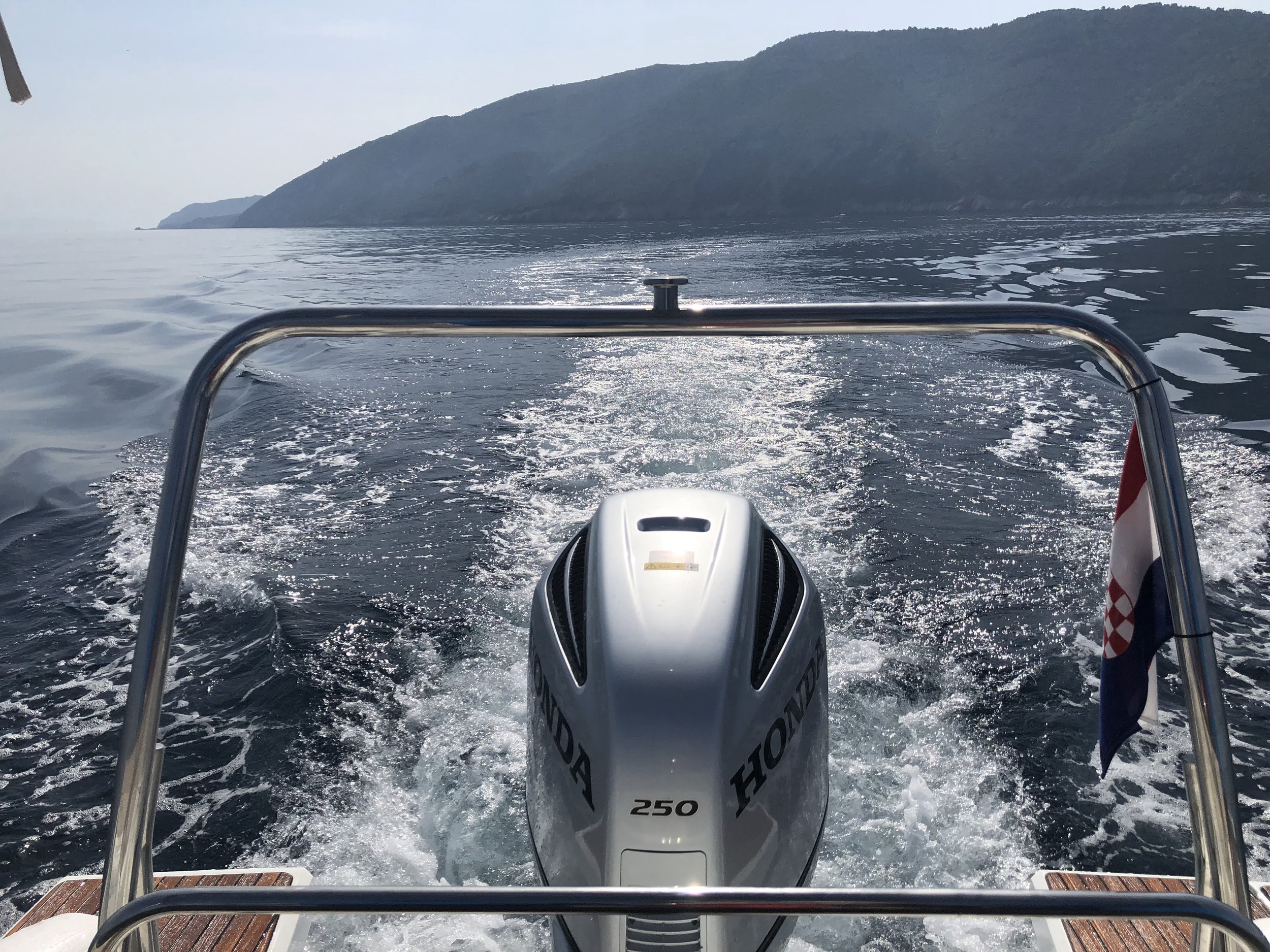 boat motor and scenery of the Adriatic Sea off the coast of Split Croatia