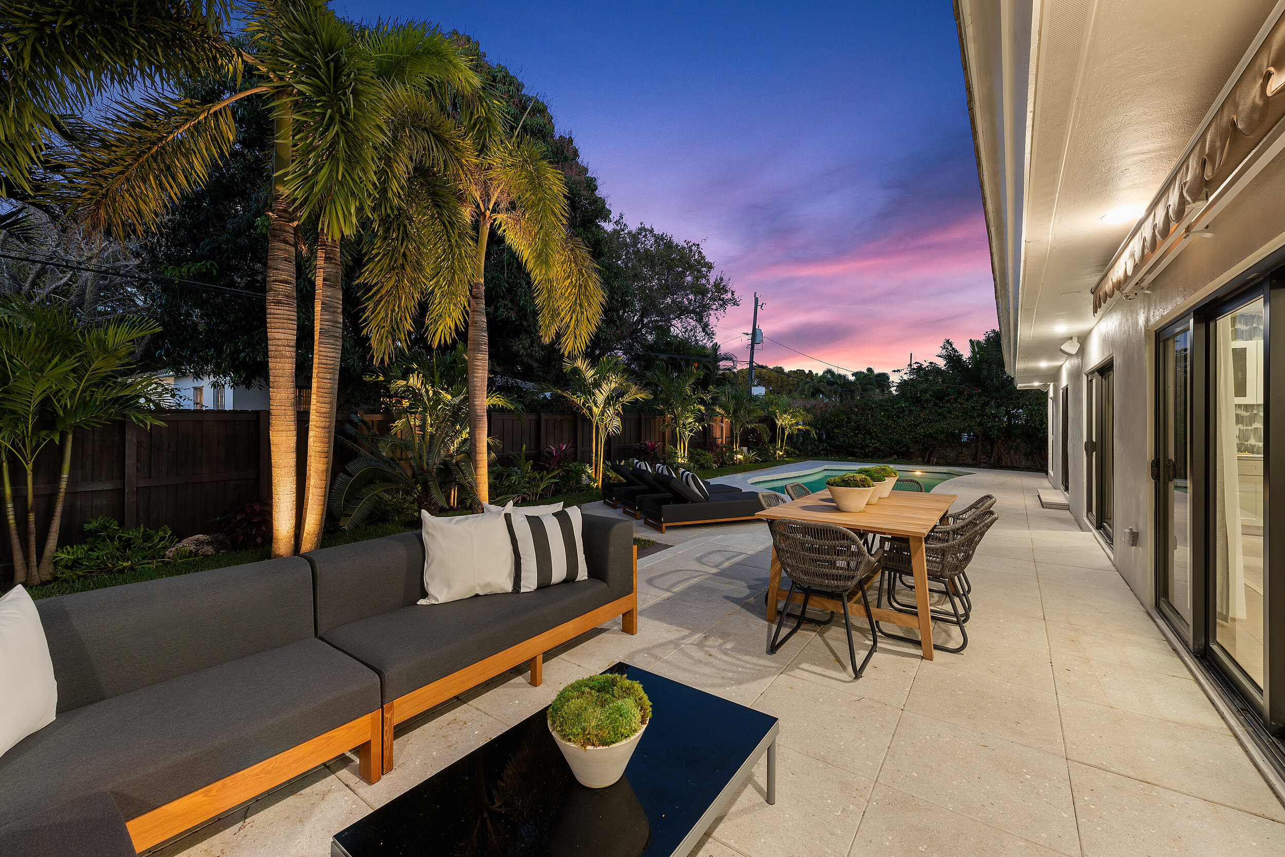 Backyard of a renovated pool home in Miami Shores
