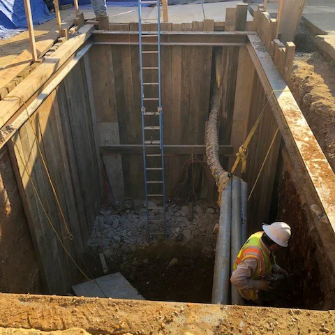 Installing the shoring needed to continue the excavation