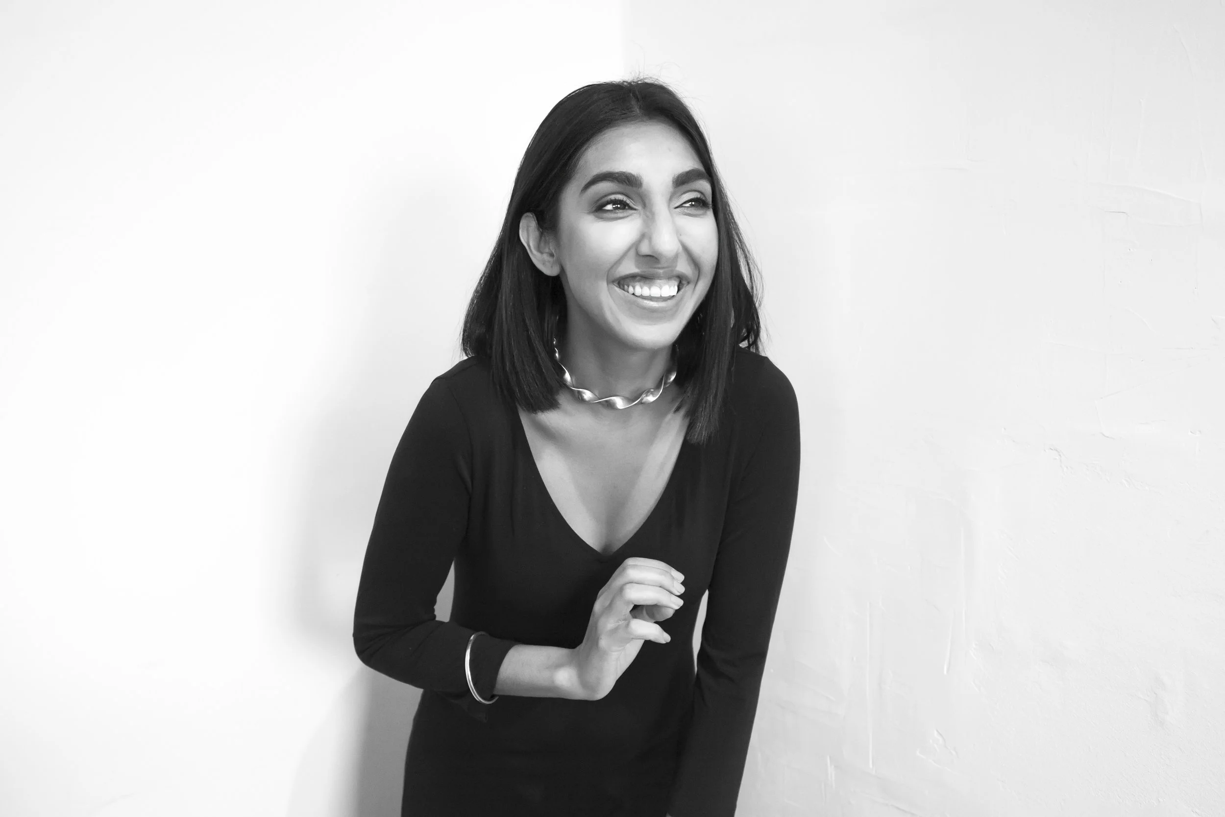 Rupi_Laughing_BW.jpg
