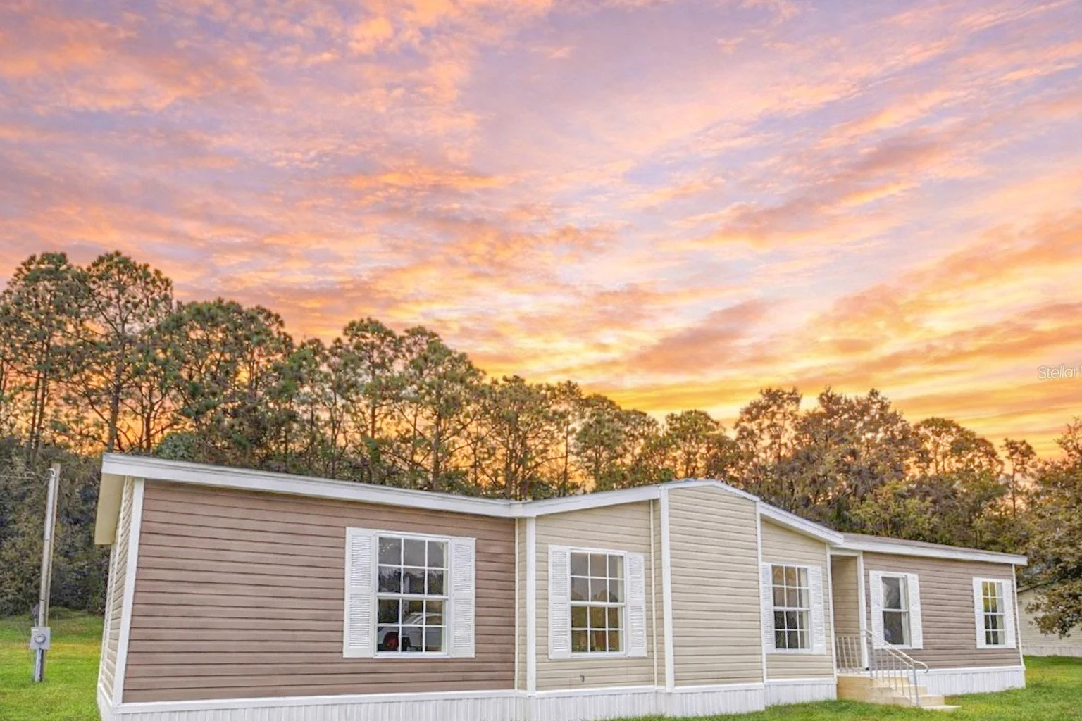 27-FRONT WITH SUNSET.jpg