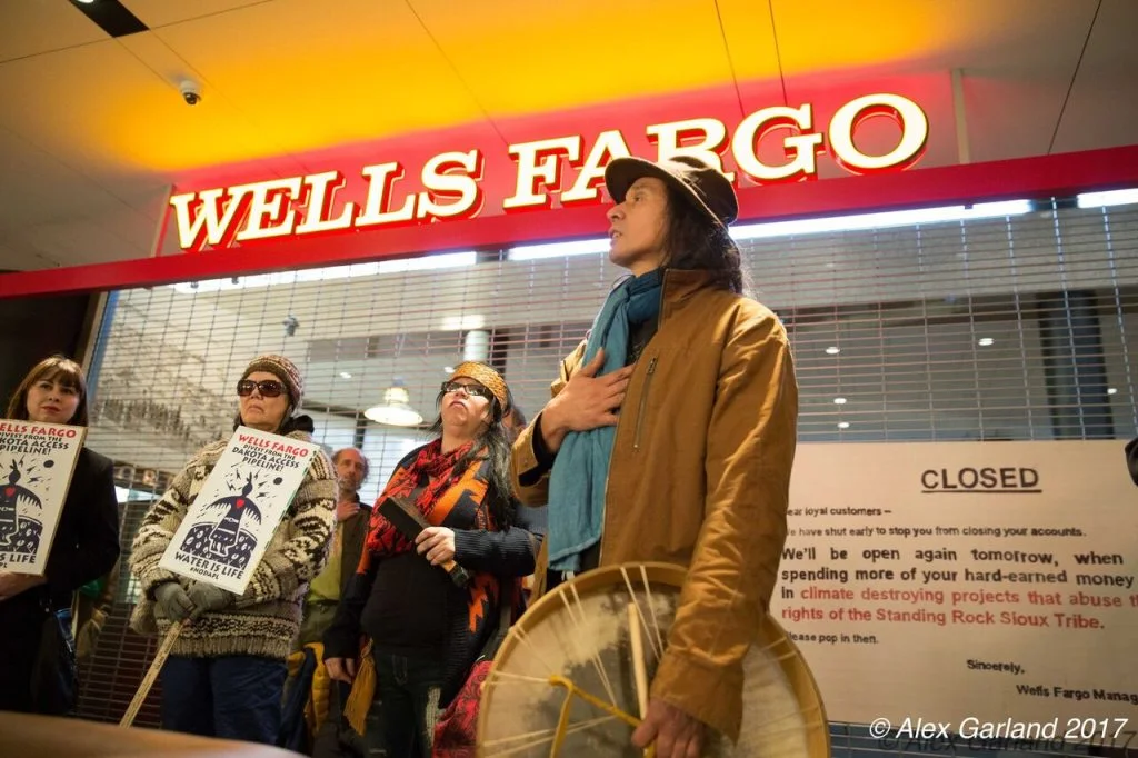 Jan 9, 2017 - Mass DefundDAPL Action held to get Seattle to Divest from Wells Fargo