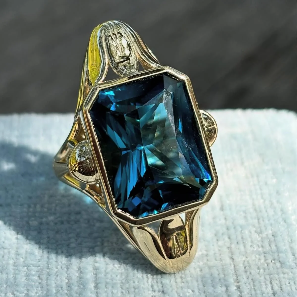 Beautiful custom ring for a special client. ✨ London blue topaz in a scissor cut (a vintage style popular in the 1920s) sparkles in a vintage inspired Egyptian setting 💙