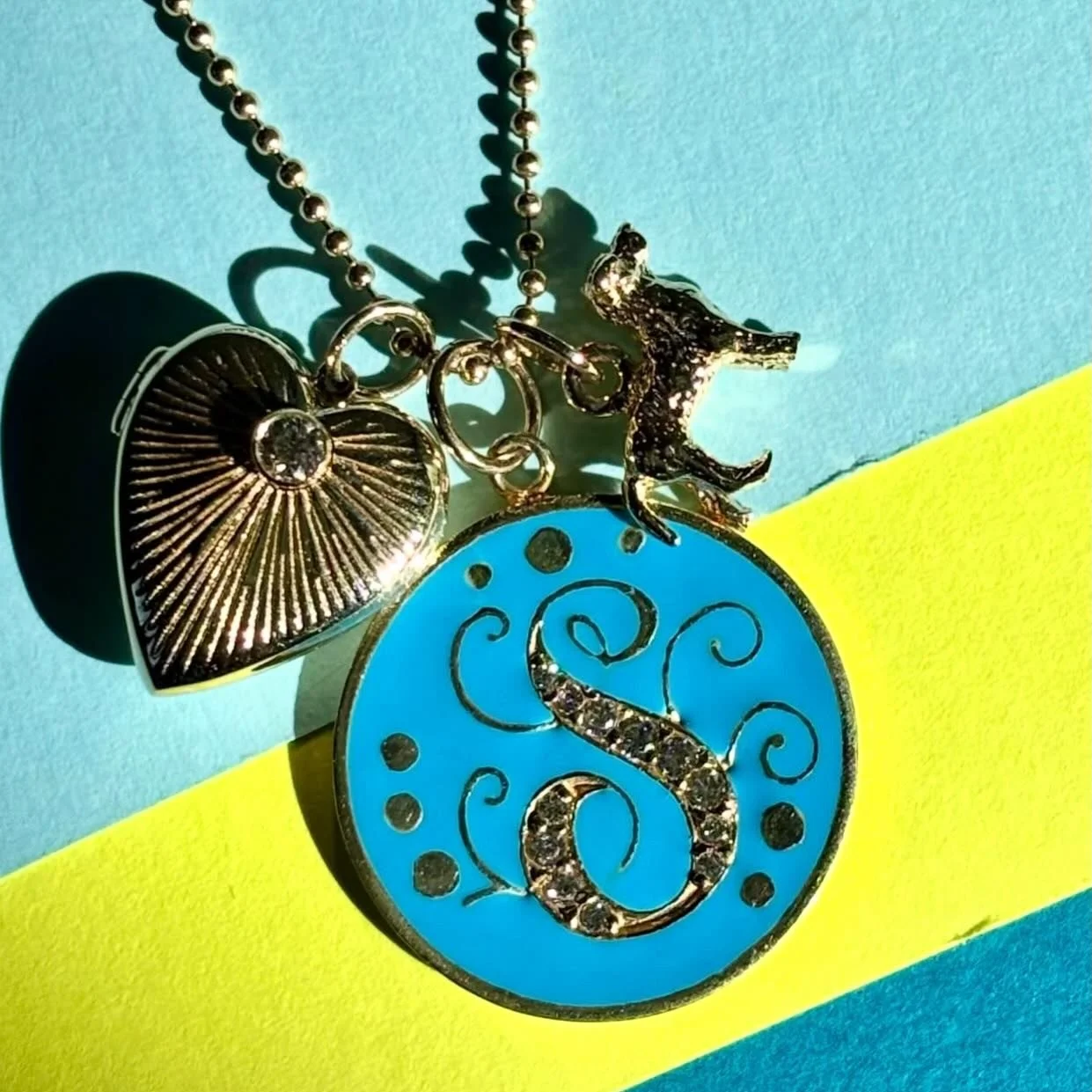 Mother&rsquo;s Day moment: fluted heart locket, vintage initial and lab charms on the sunset chain 🩵