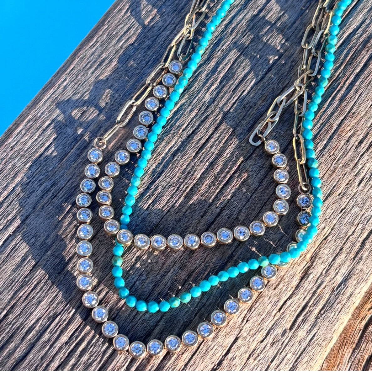Styling tip: Add turquoise to dress up or down your necklace stack.